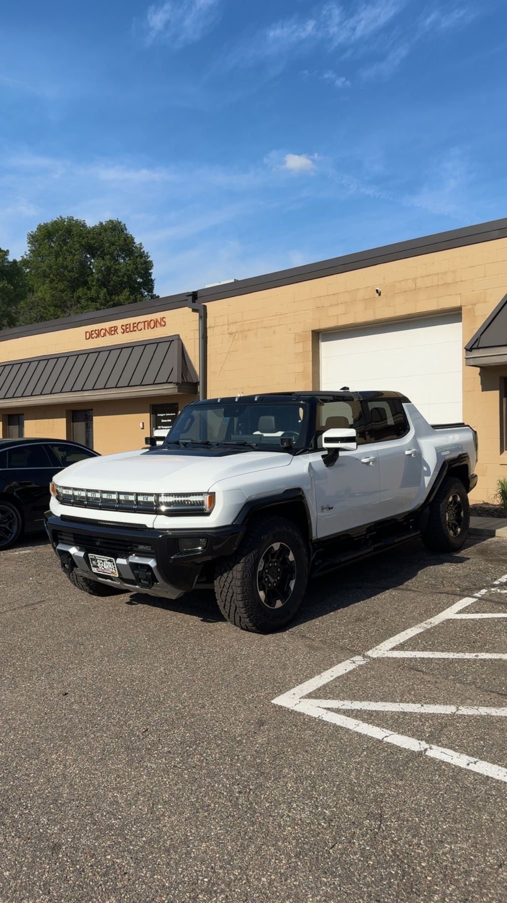 GMC Hummer EV pickup with professionally installed window tint